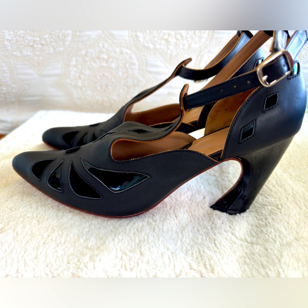 John Fluvog black high heel shoes.